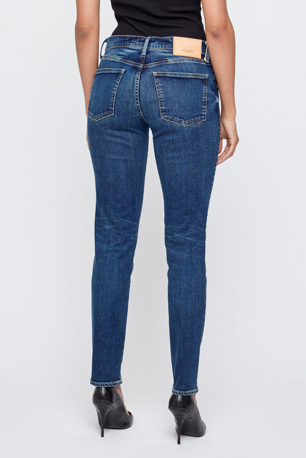 Moussy Vintage skinny jeans in medium blue wash modeled from behind