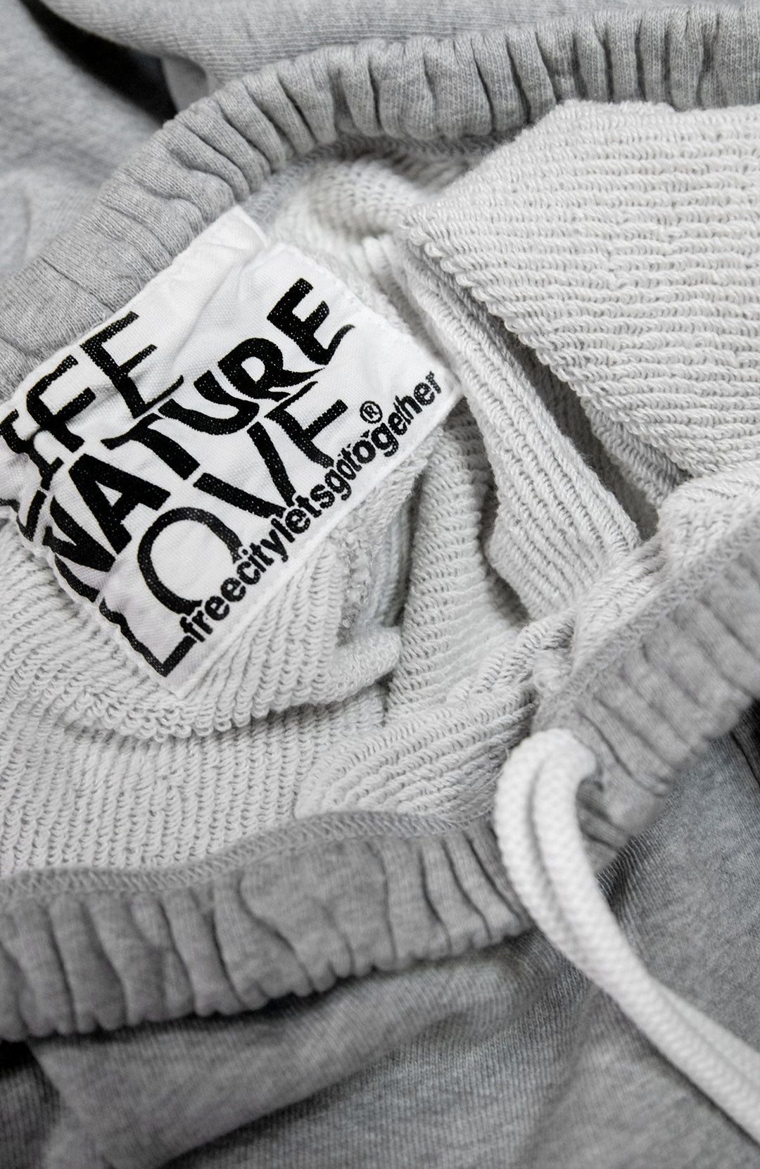 Free City sweatpants in gray with white drawstring and brand label detail