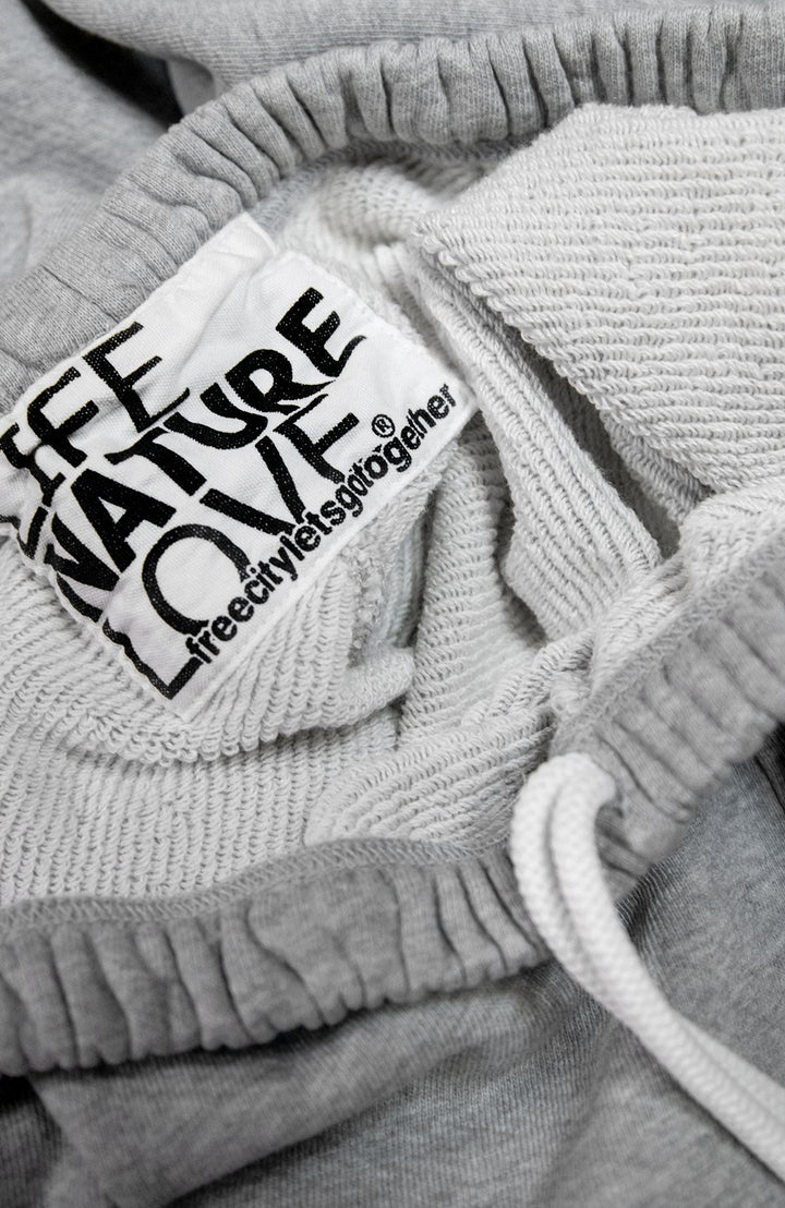 Free City sweatpants in gray with white drawstring and brand label detail