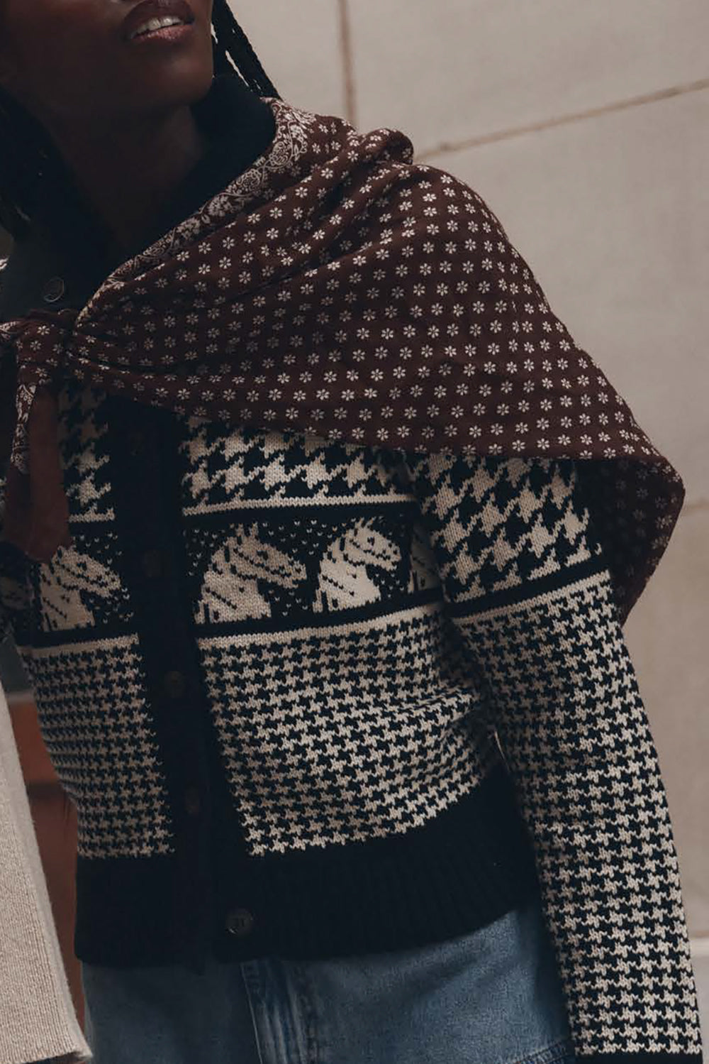 The Great Pony Cardigan in black and cream Fair Isle knit with houndstooth pattern and brown floral scarf