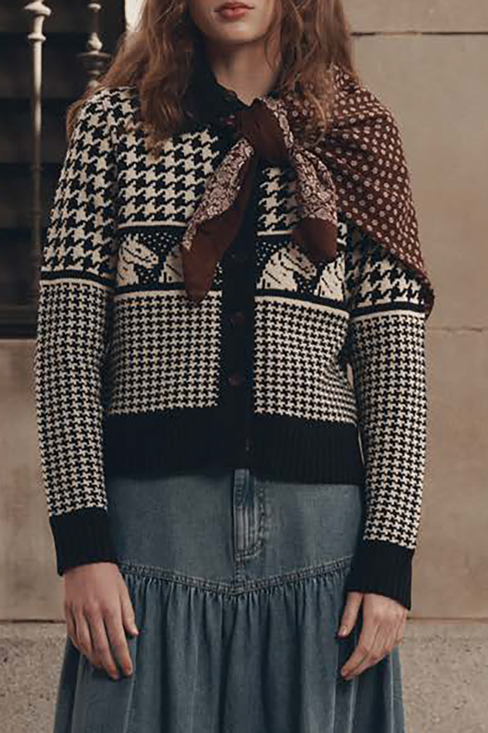 The Great Pony Cardigan in black and cream houndstooth knit with horse motif band