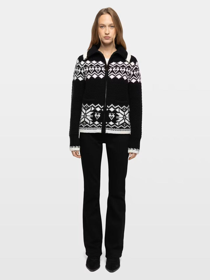 Black and white Fair Isle zip-up knit cardigan with Nordic snowflake pattern on model