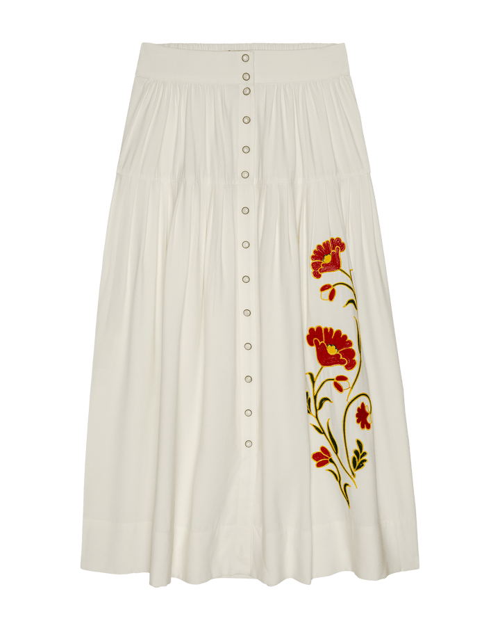 White embroidered midi skirt with red floral design and button-front closure