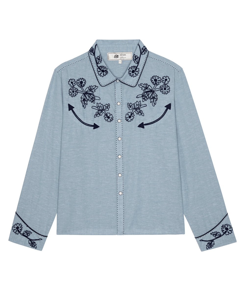Light blue chambray western shirt with navy floral embroidery and arrow details
