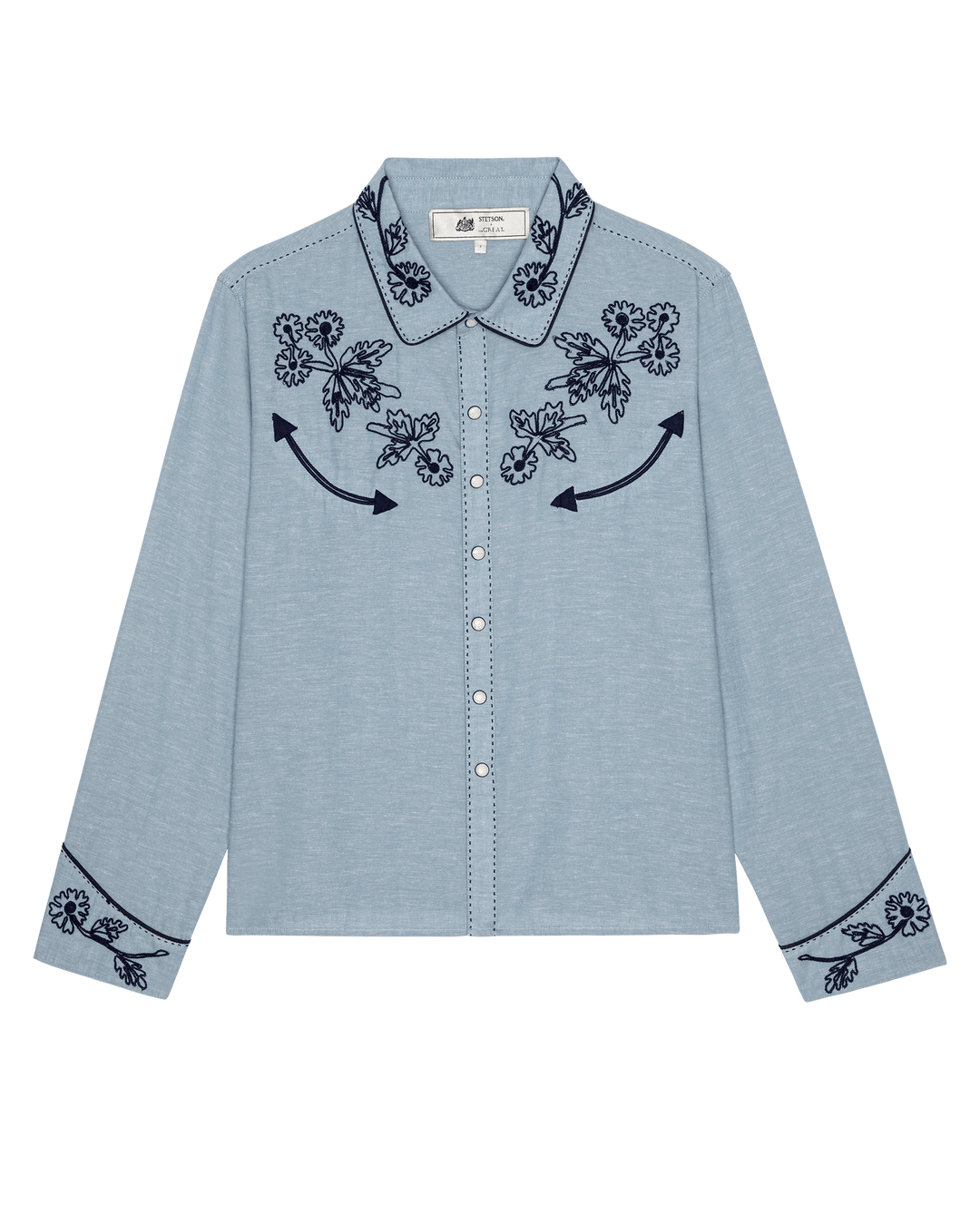 Light blue chambray western shirt with navy floral embroidery and arrow details