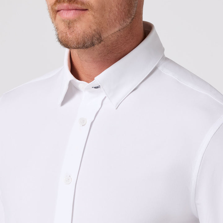 Mizzen & Main Leeward long sleeve white dress shirt with button-down collar on male model